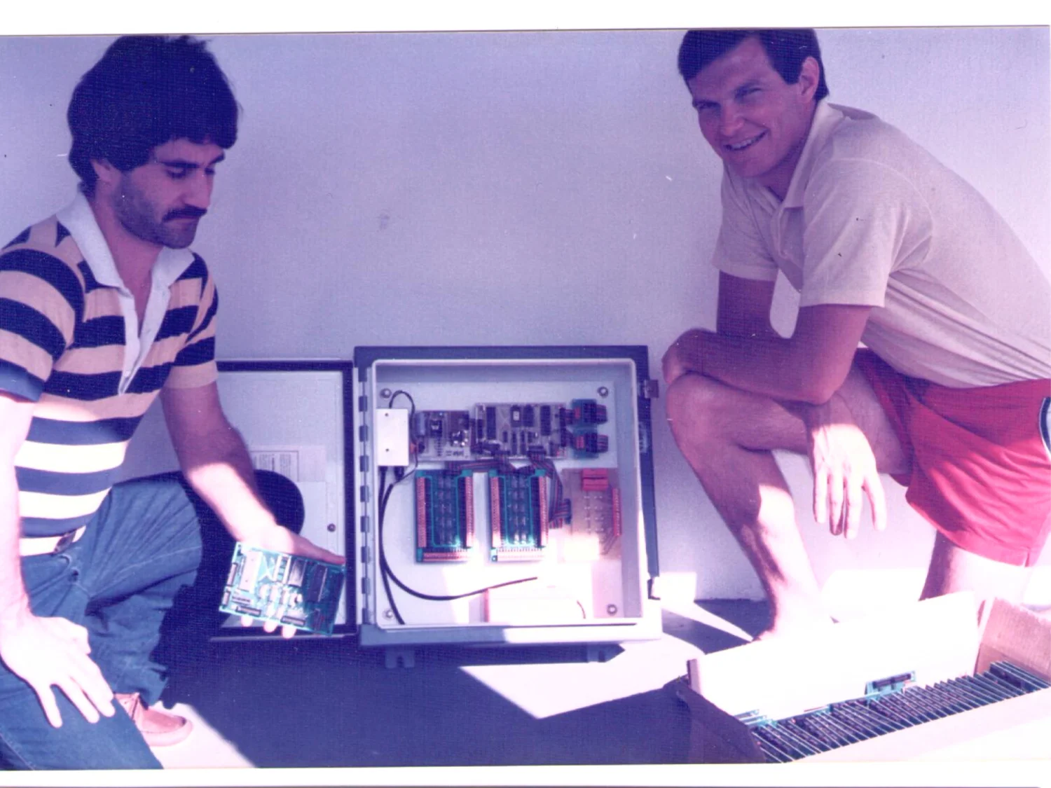 Tony Diodato and Jeff Roberts with an early Cypress control panel in South Florida